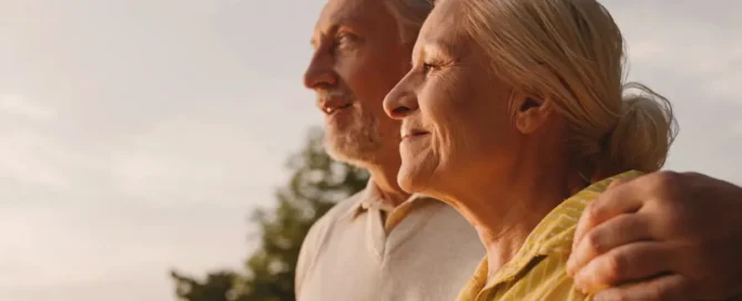 Older couple at sunset representing sundowning in seniors and late-day agitation
